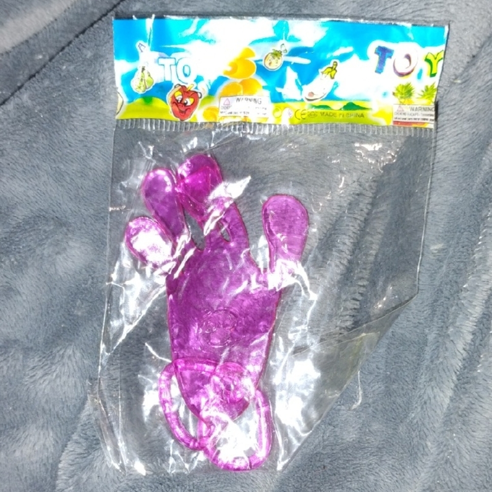 Purple Toy Hand